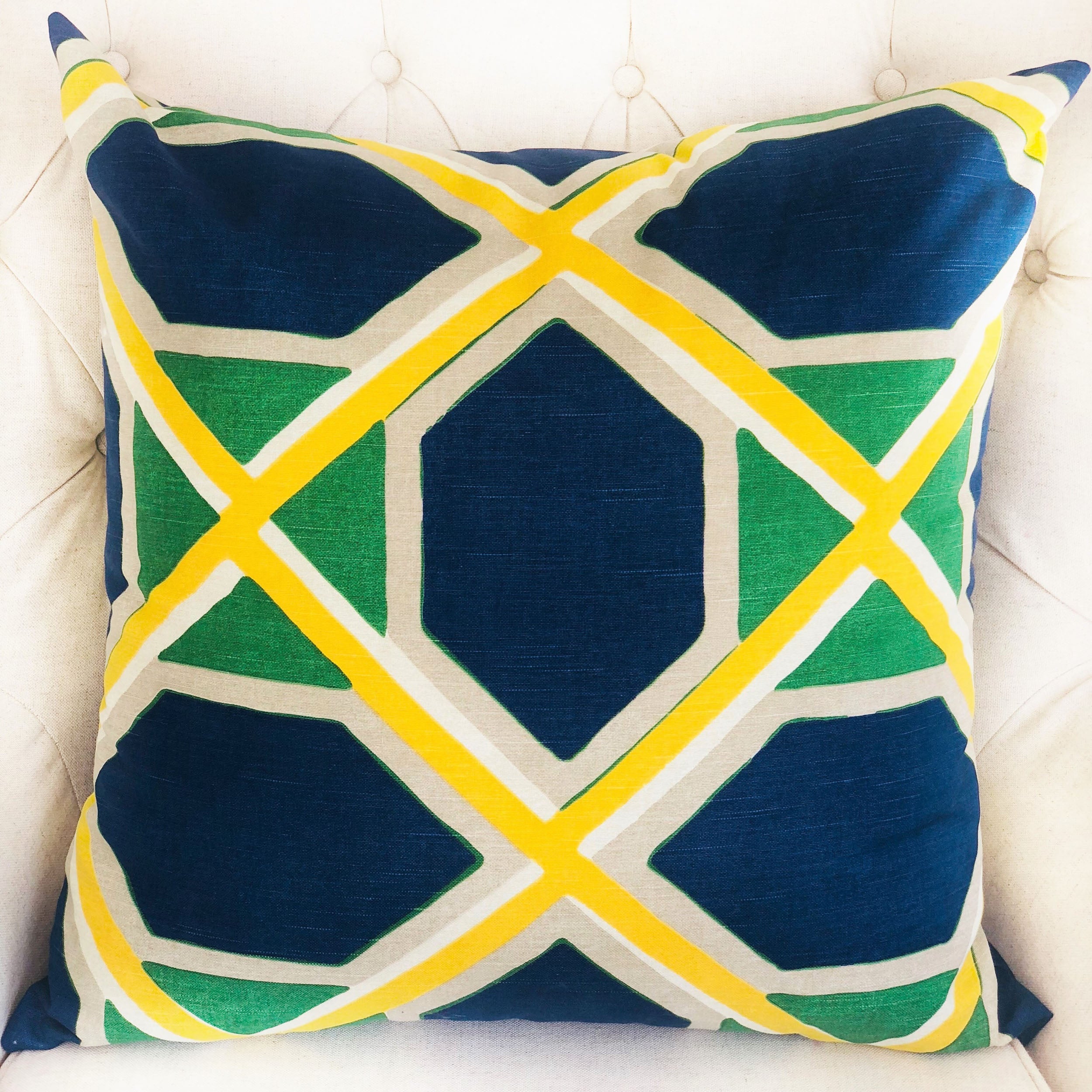 Obliquity Blue, Yellow and Green Luxury Throw Pillow featuring geometric patterns and vibrant colors, handmade in the USA.