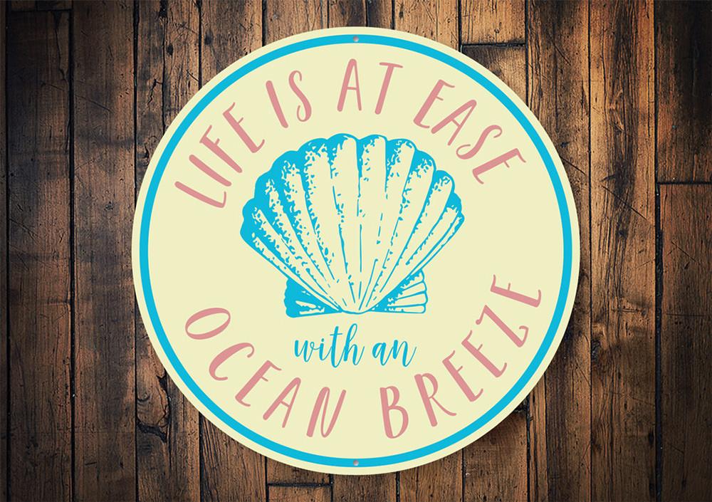 Ocean Breeze Sign featuring a coastal design, made from high-quality aluminum, perfect for beach-themed decor.