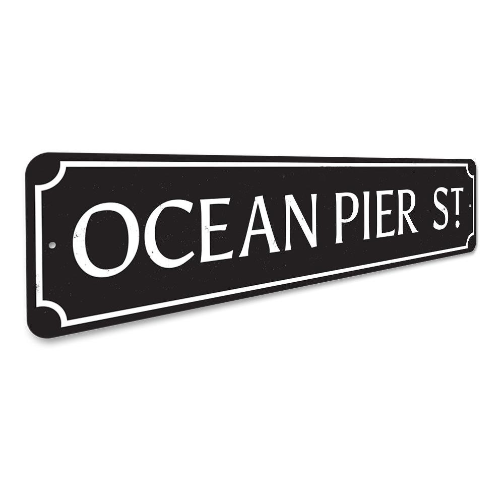 Ocean Pier Street Sign made of high-quality aluminum, featuring a coastal design perfect for beach-themed decor.