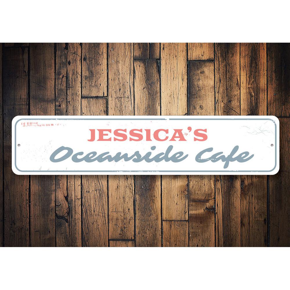 Oceanside Cafe Sign made of durable aluminum, featuring beach-themed design, perfect for coastal decor.