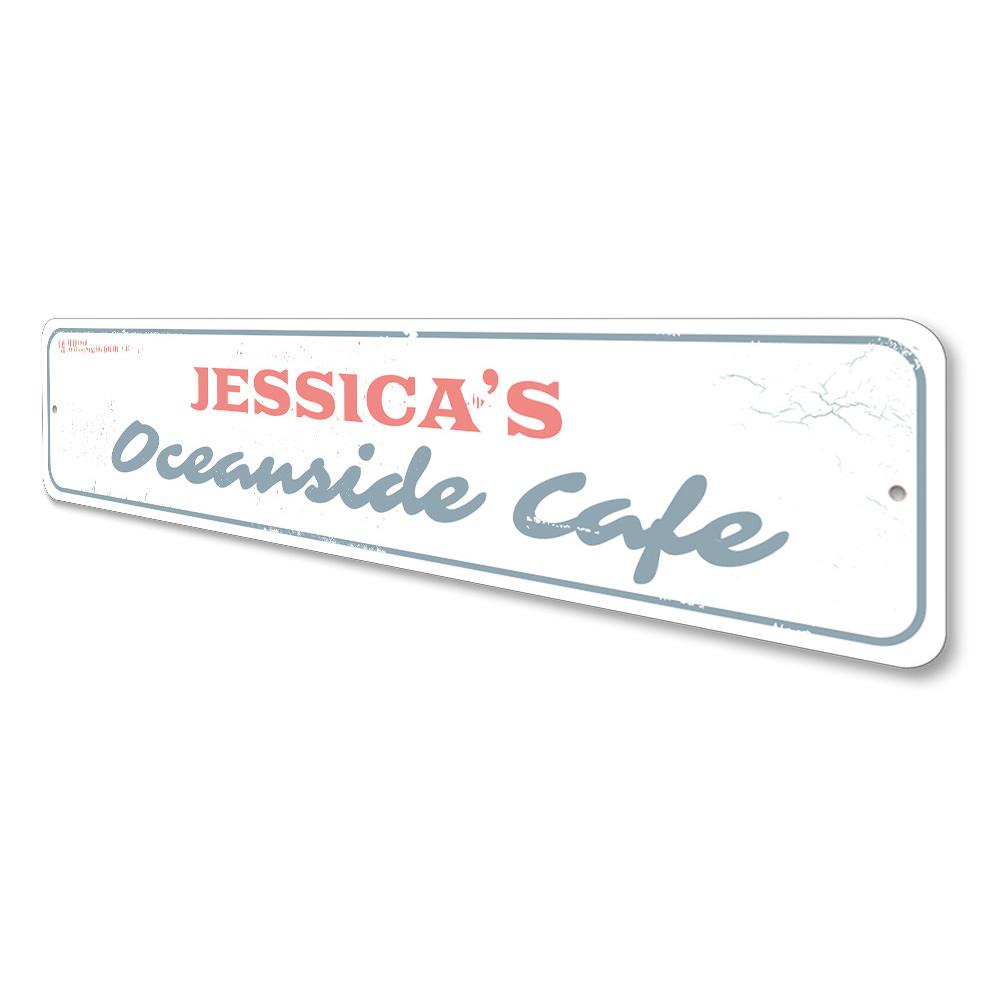 Oceanside Cafe Sign made of durable aluminum, featuring beach-themed design, perfect for coastal decor.