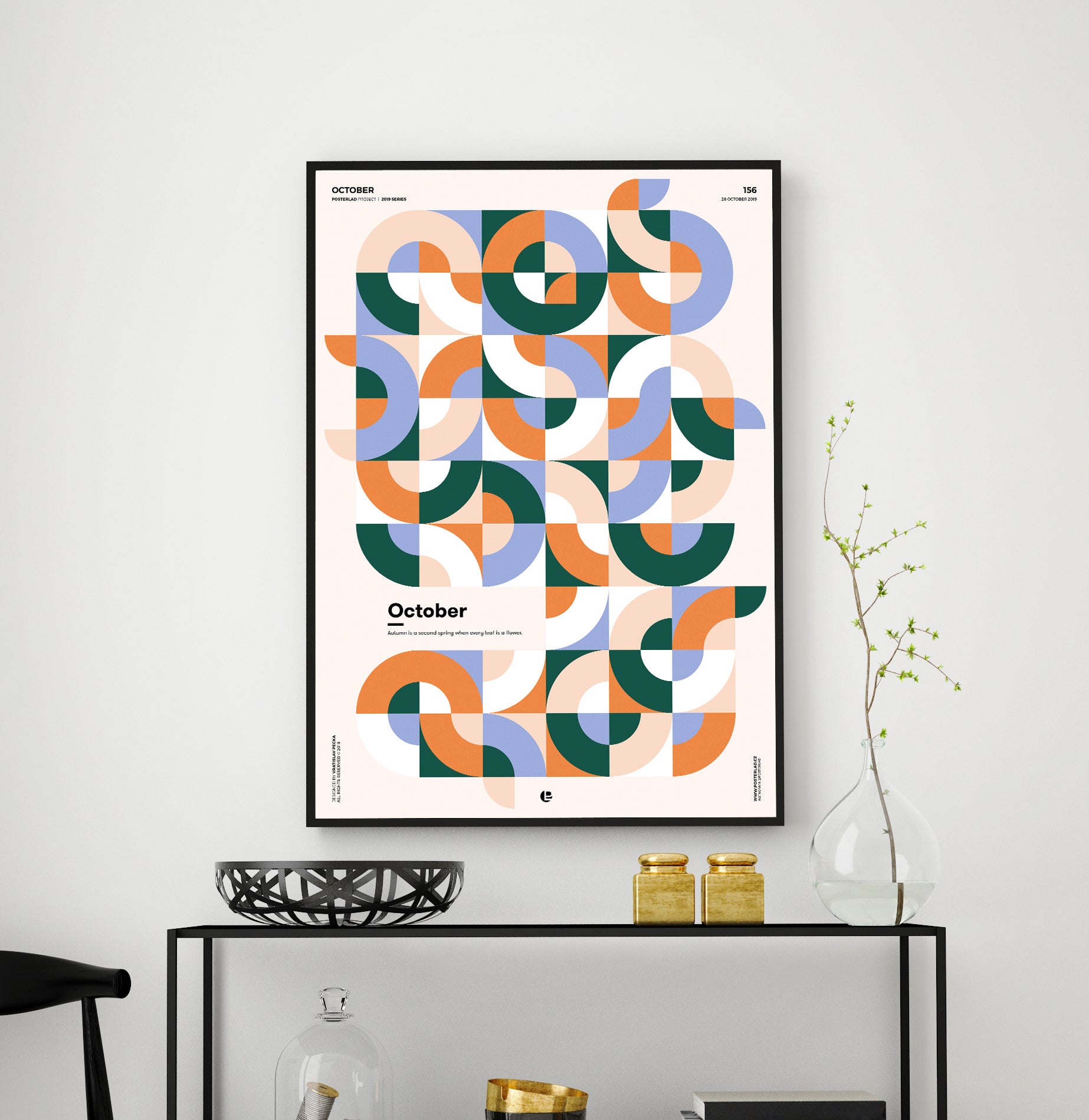 A vibrant October poster featuring colorful autumn leaves resembling flowers, printed on thick matte paper.