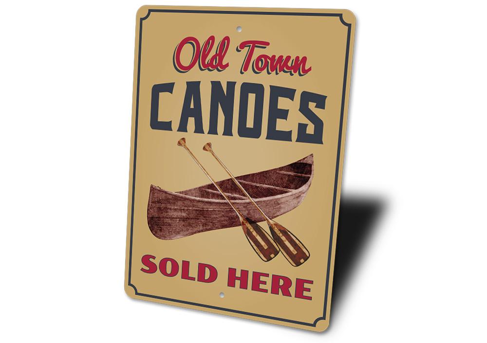 Old Town Canoes Sign made of high-quality aluminum, featuring a decorative design perfect for lakeside homes.