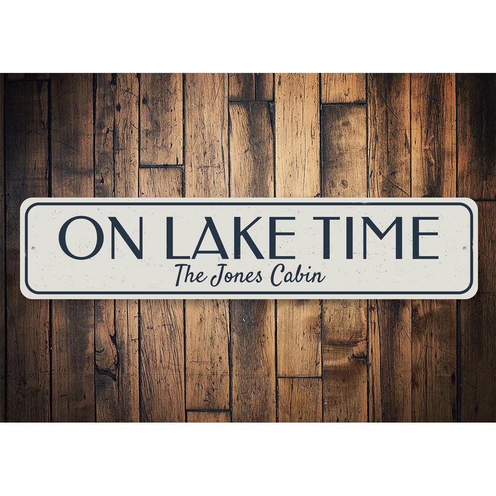 On Lake Time Sign made of durable aluminum, featuring a rustic design perfect for lakehouse decor.