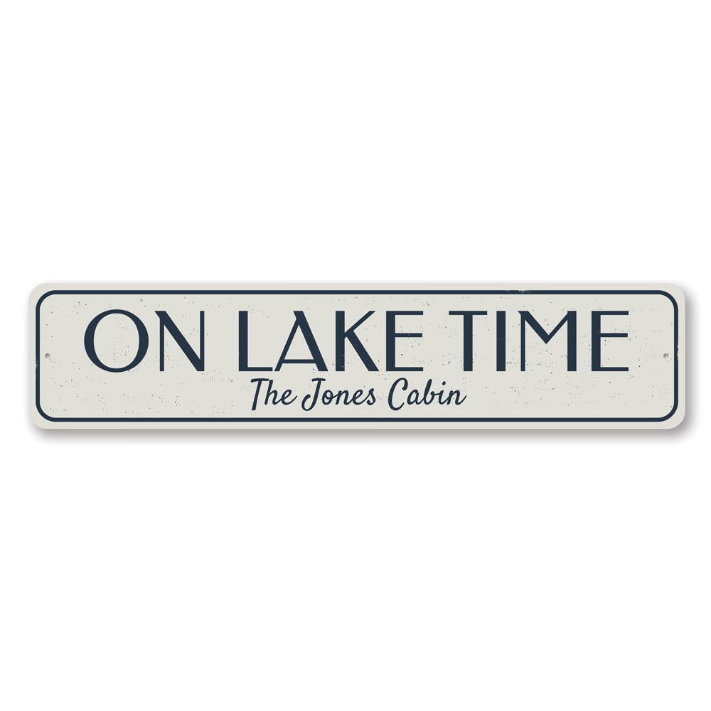 On Lake Time Sign made of durable aluminum, featuring a rustic design perfect for lakehouse decor.