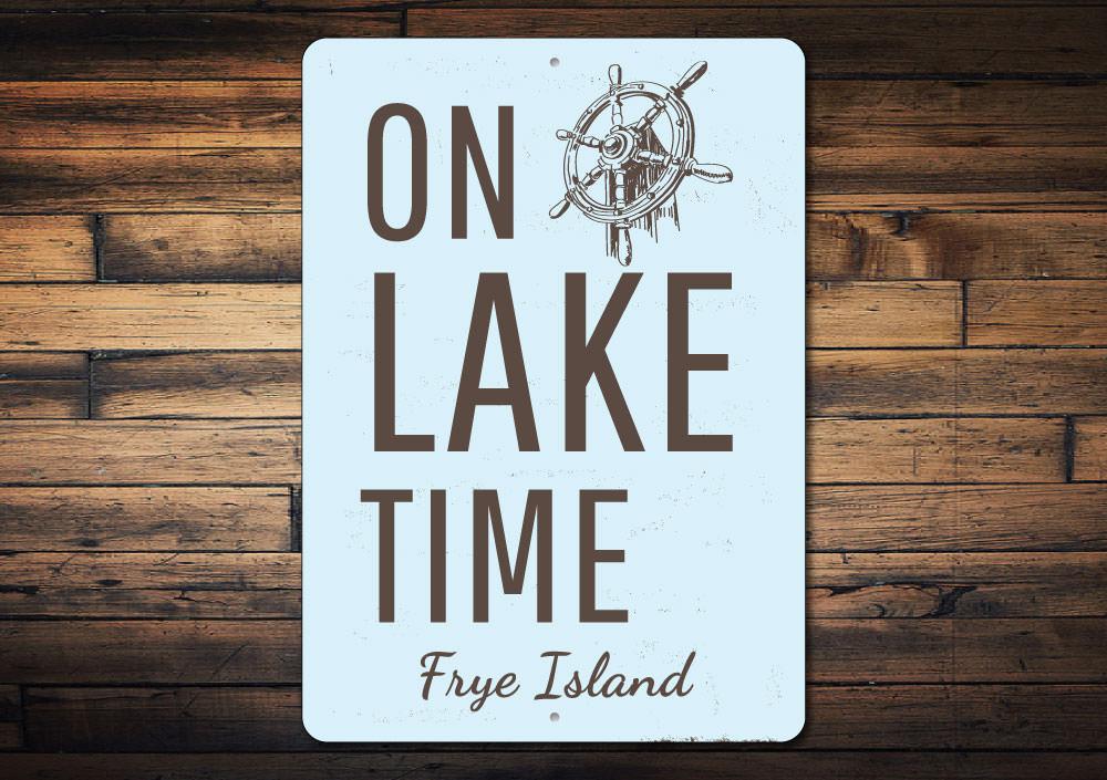 On Lake Time Wheel Sign made of durable aluminum, featuring a rustic design perfect for lakehouses.