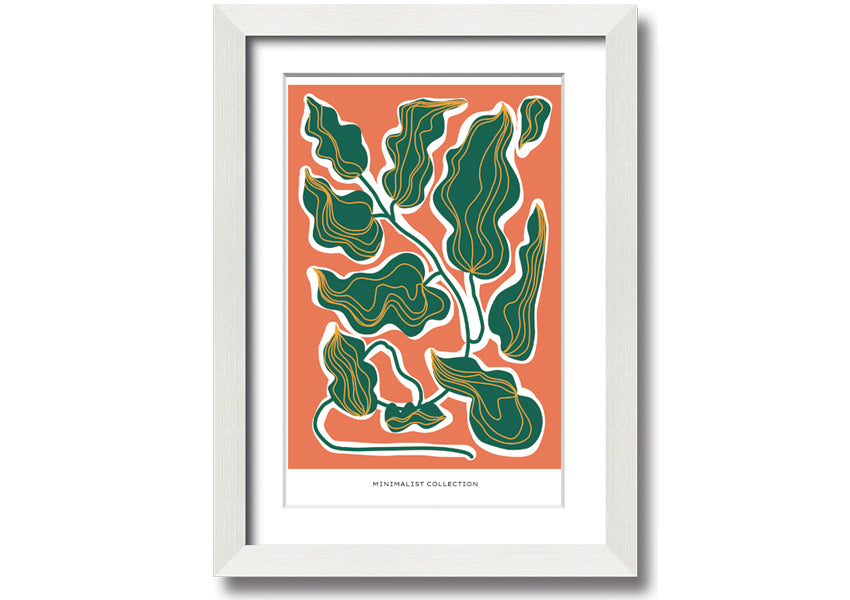 Framed print of orange and green leaves, showcasing vibrant colors and intricate details, ready to hang.