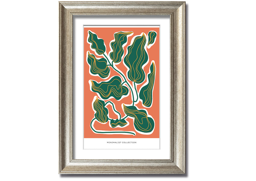 Framed print of orange and green leaves, showcasing vibrant colors and intricate details, ready to hang.