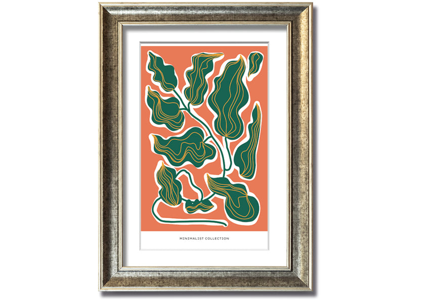 Framed print of orange and green leaves, showcasing vibrant colors and intricate details, ready to hang.