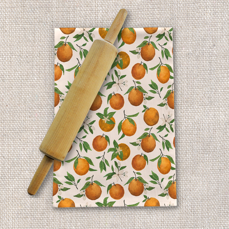 Orange Blossom Tea Towel made of cotton twill, featuring a vibrant floral design, perfect for kitchen use and decoration.