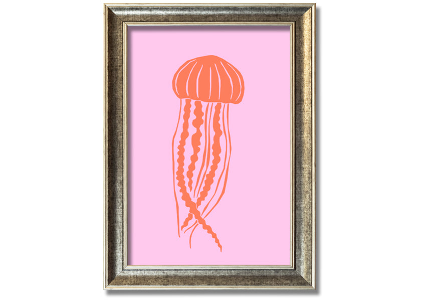 Framed print of an orange jellyfish on a pink background, showcasing vibrant colors and intricate details.