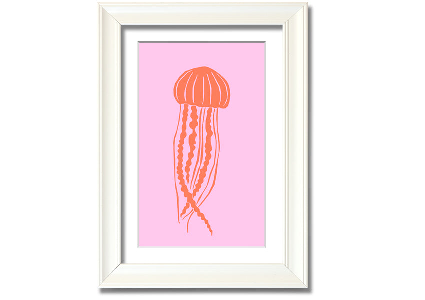 Framed print of an orange jellyfish on a pink background, showcasing vibrant colors and intricate details.