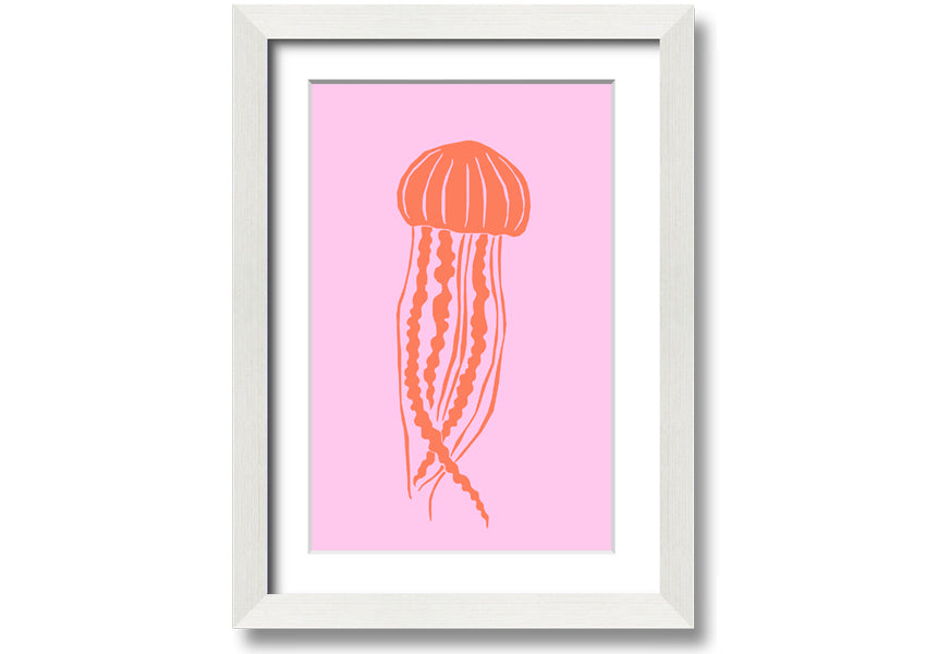 Framed print of an orange jellyfish on a pink background, showcasing vibrant colors and intricate details.