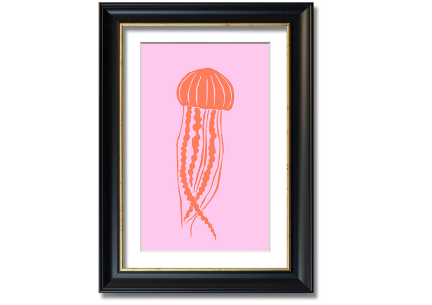 Framed print of an orange jellyfish on a pink background, showcasing vibrant colors and intricate details.