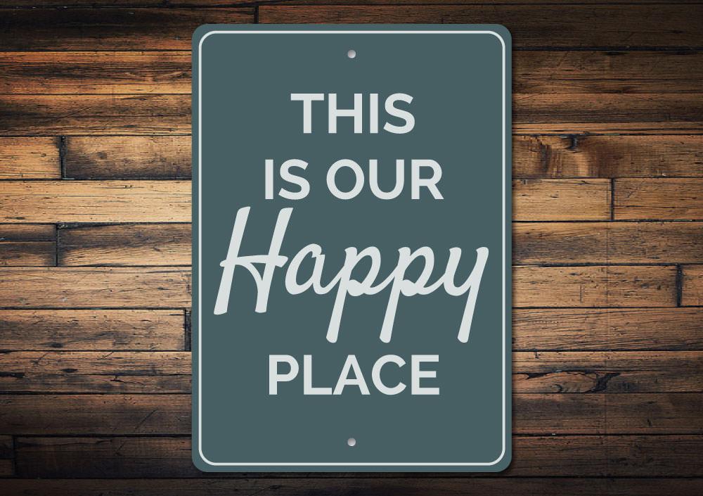 A decorative aluminum sign reading 'Our Happy Place', featuring vibrant colors and a beach-themed design, perfect for coastal decor.