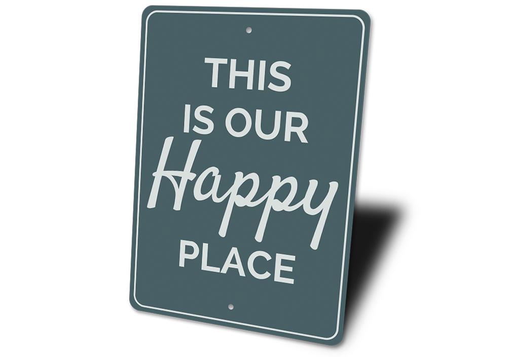 A decorative aluminum sign reading 'Our Happy Place', featuring vibrant colors and a beach-themed design, perfect for coastal decor.