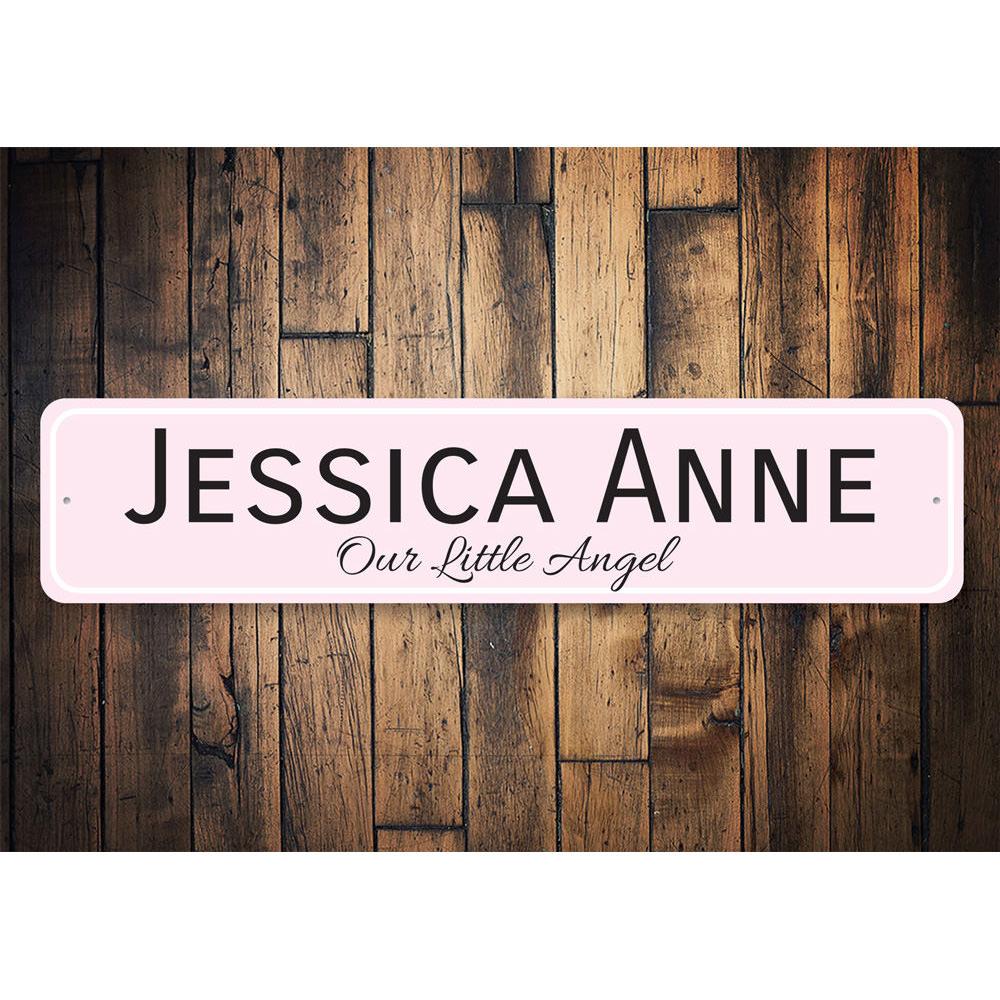 A beautifully crafted Our Little Angel Sign made from high-quality aluminum, featuring customizable text for a personalized touch.