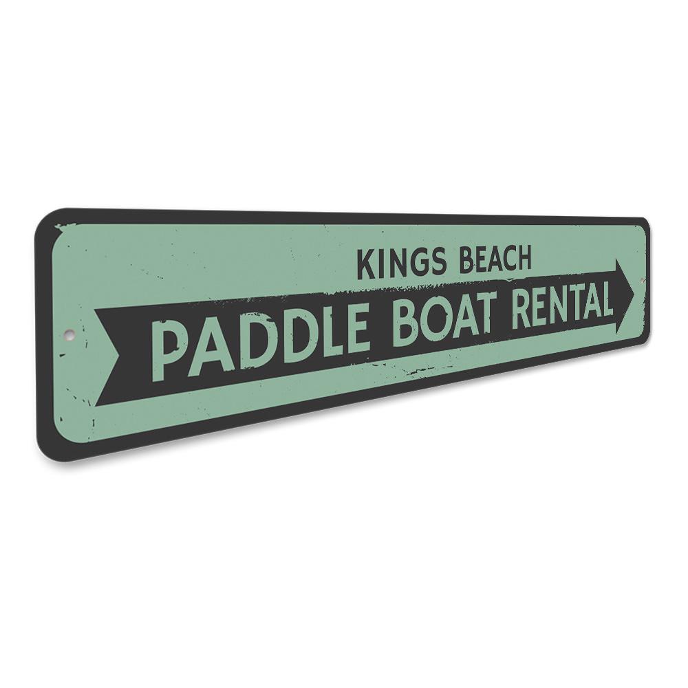 A vibrant Paddle Boat Rental Sign made of durable aluminum, featuring customizable text and pre-drilled holes for easy mounting, perfect for beach-themed decor.