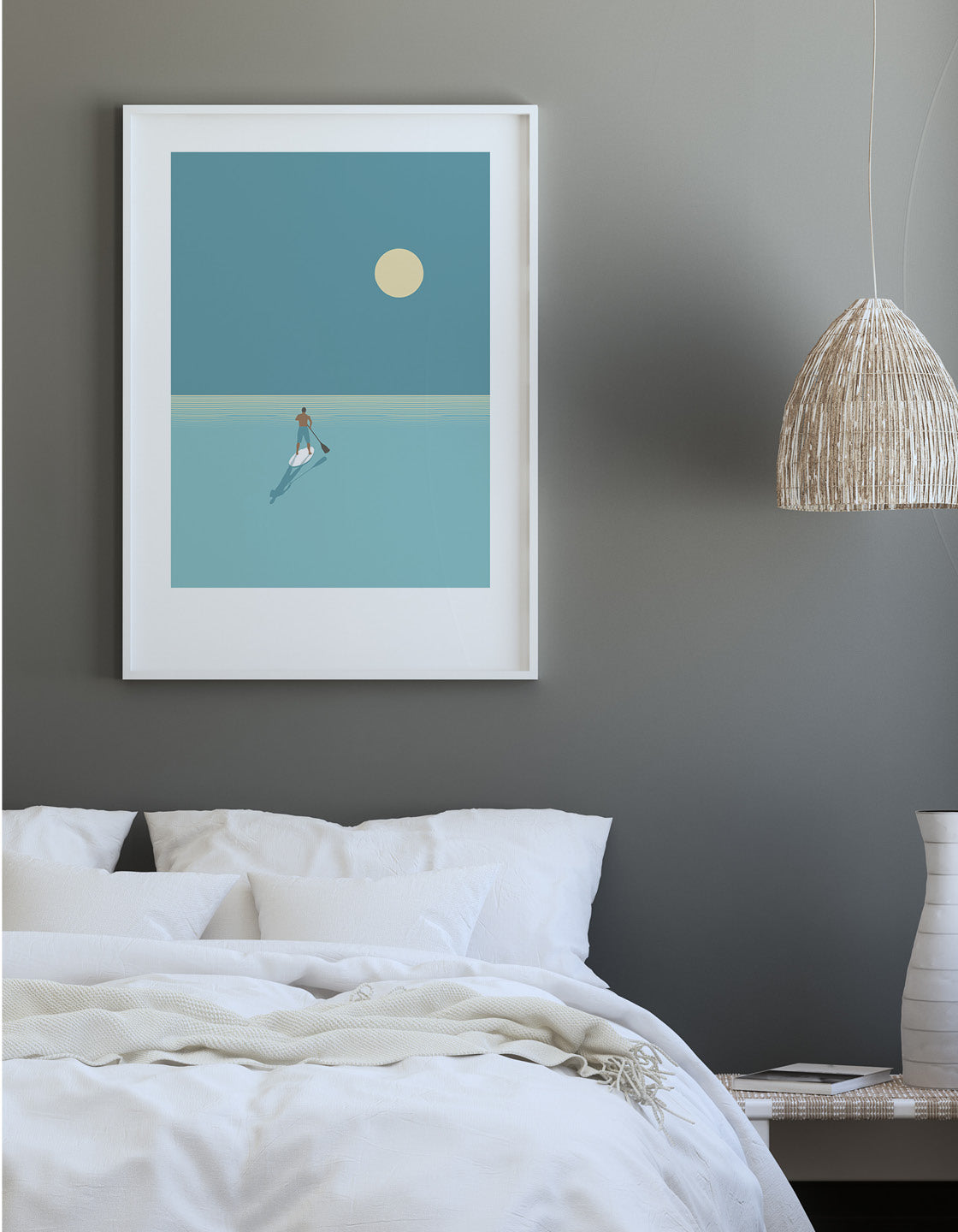 A serene paddleboarder silhouetted against a vibrant sunset, showcasing cool blues and minimalist design.