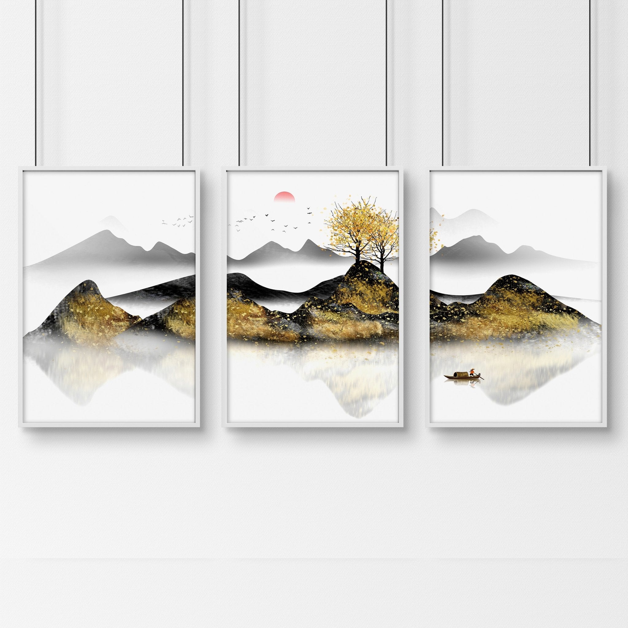 Set of 3 framed wall art prints depicting serene Japanese sunrise landscapes with shimmering gold details, perfect for bedroom decor.