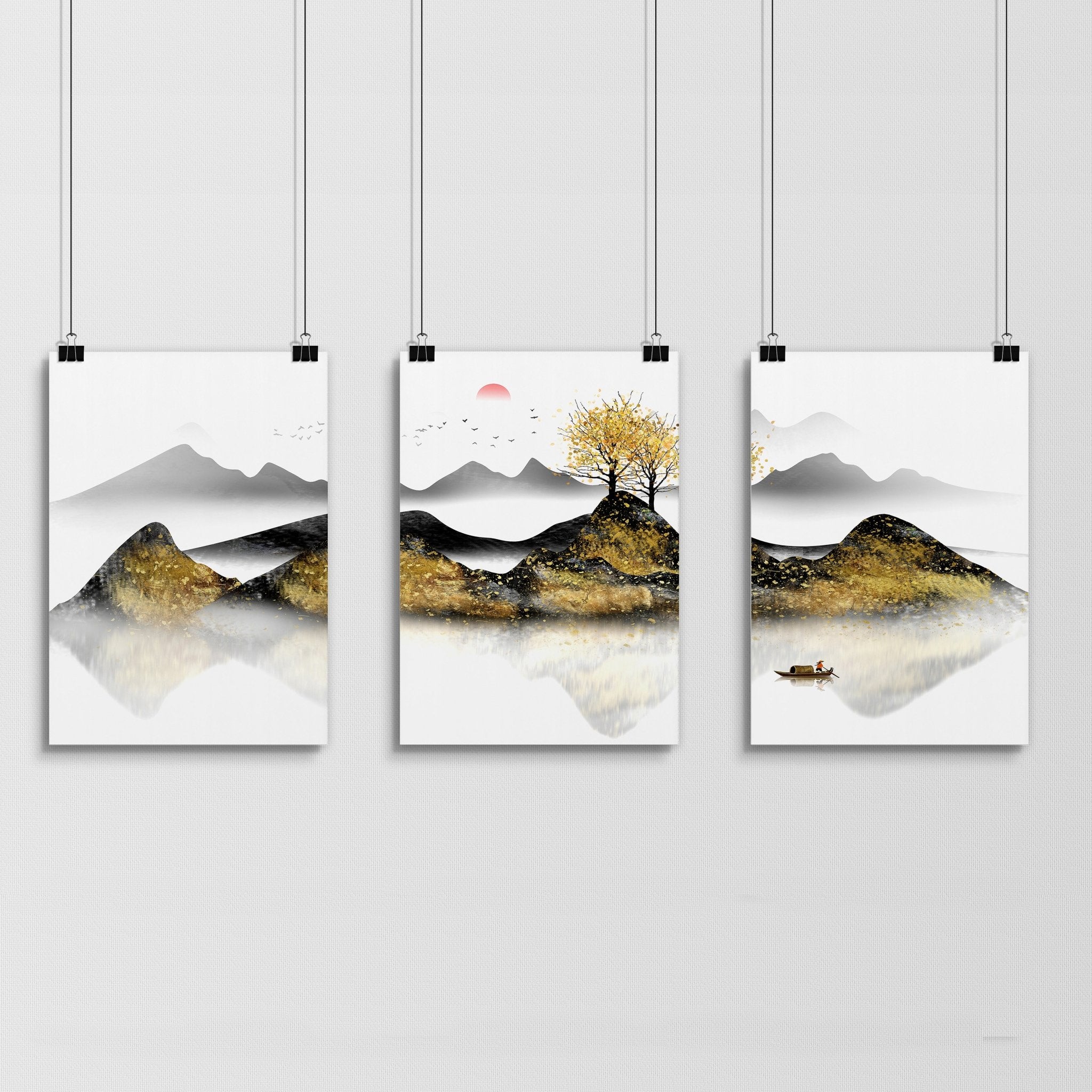 Set of 3 framed wall art prints depicting serene Japanese sunrise landscapes with shimmering gold details, perfect for bedroom decor.