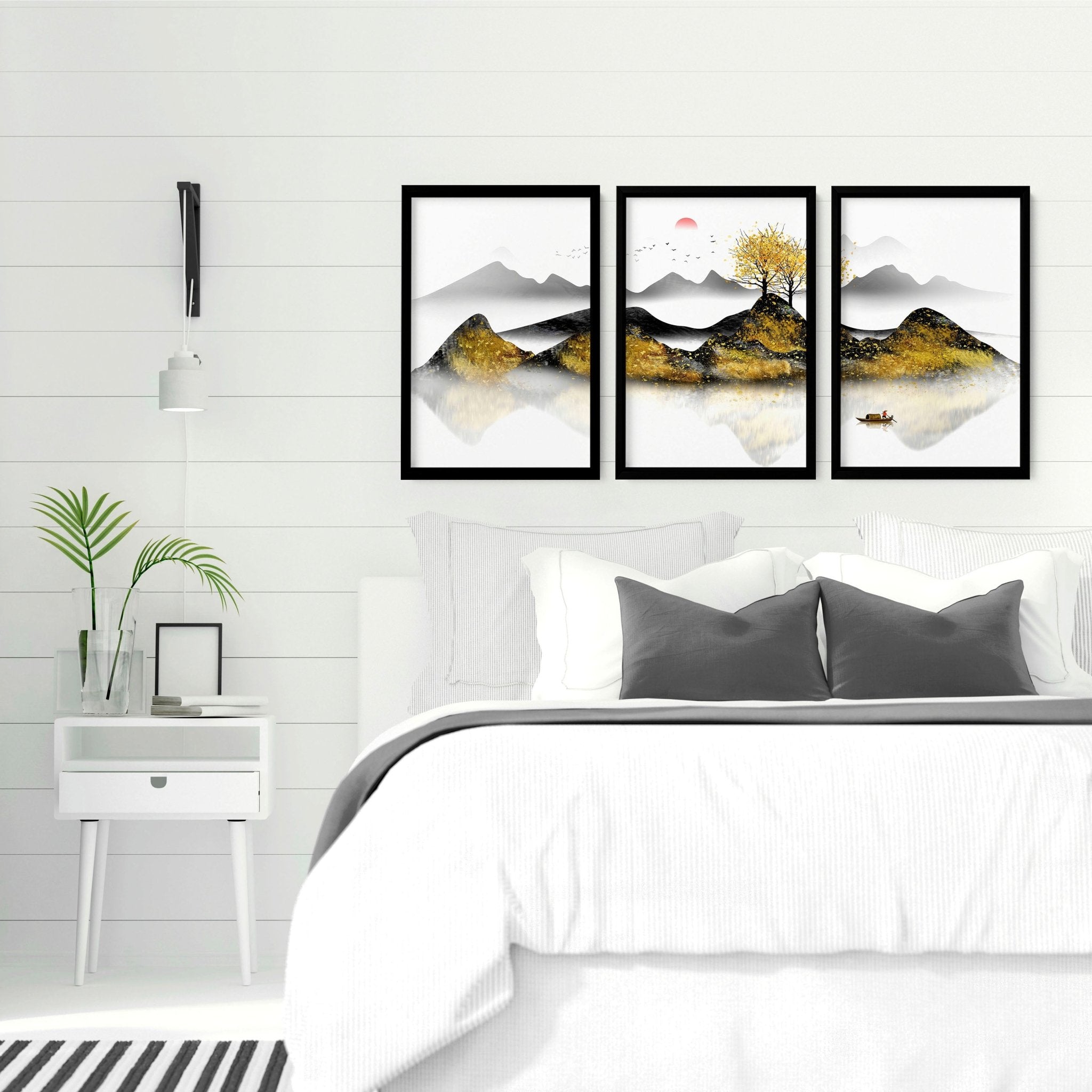 Set of 3 framed wall art prints depicting serene Japanese sunrise landscapes with shimmering gold details, perfect for bedroom decor.