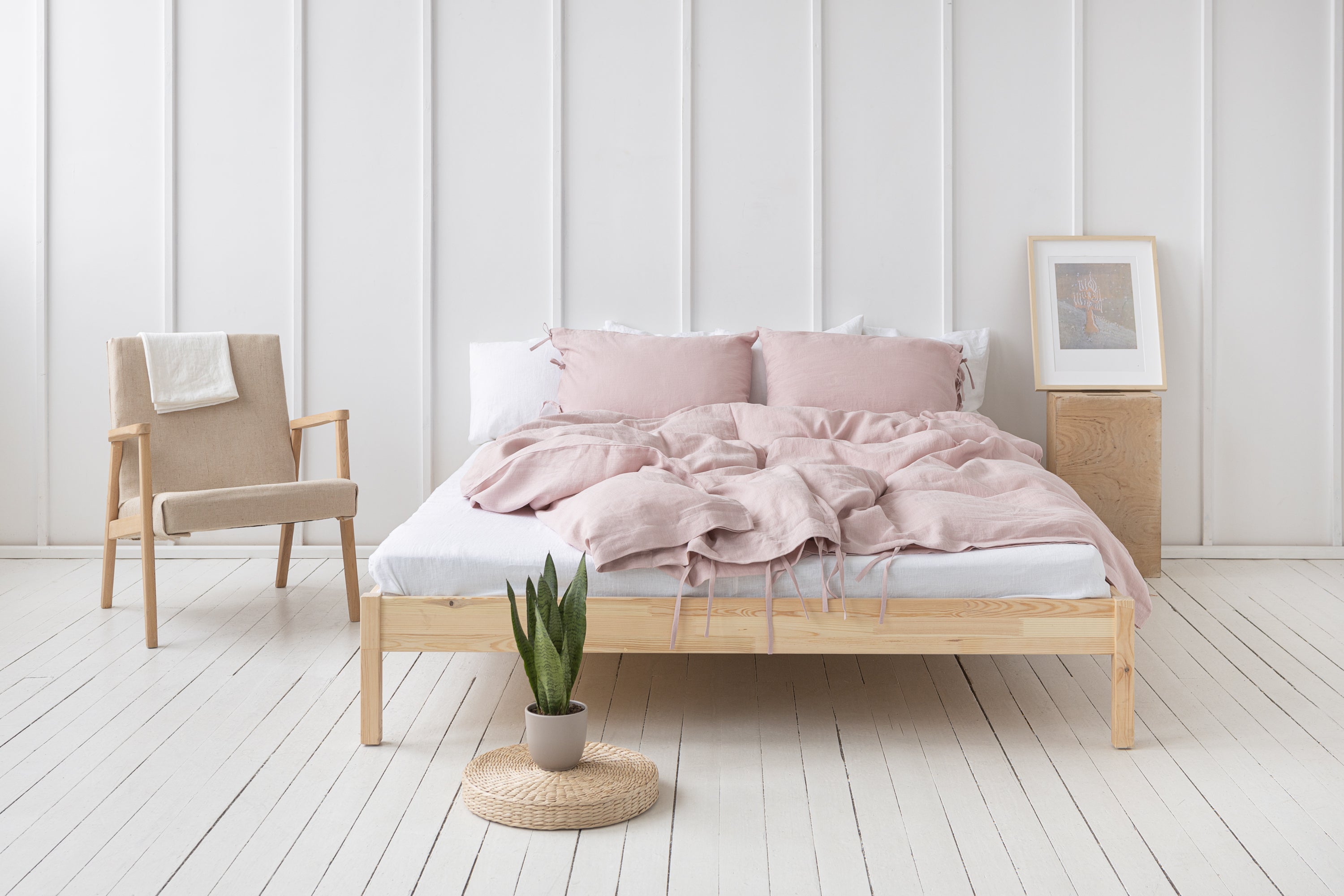 Pale Pink linen bedding set featuring duvet cover, bedsheet, and pillowcases with tie closures, elegantly styled for a minimalist bedroom.