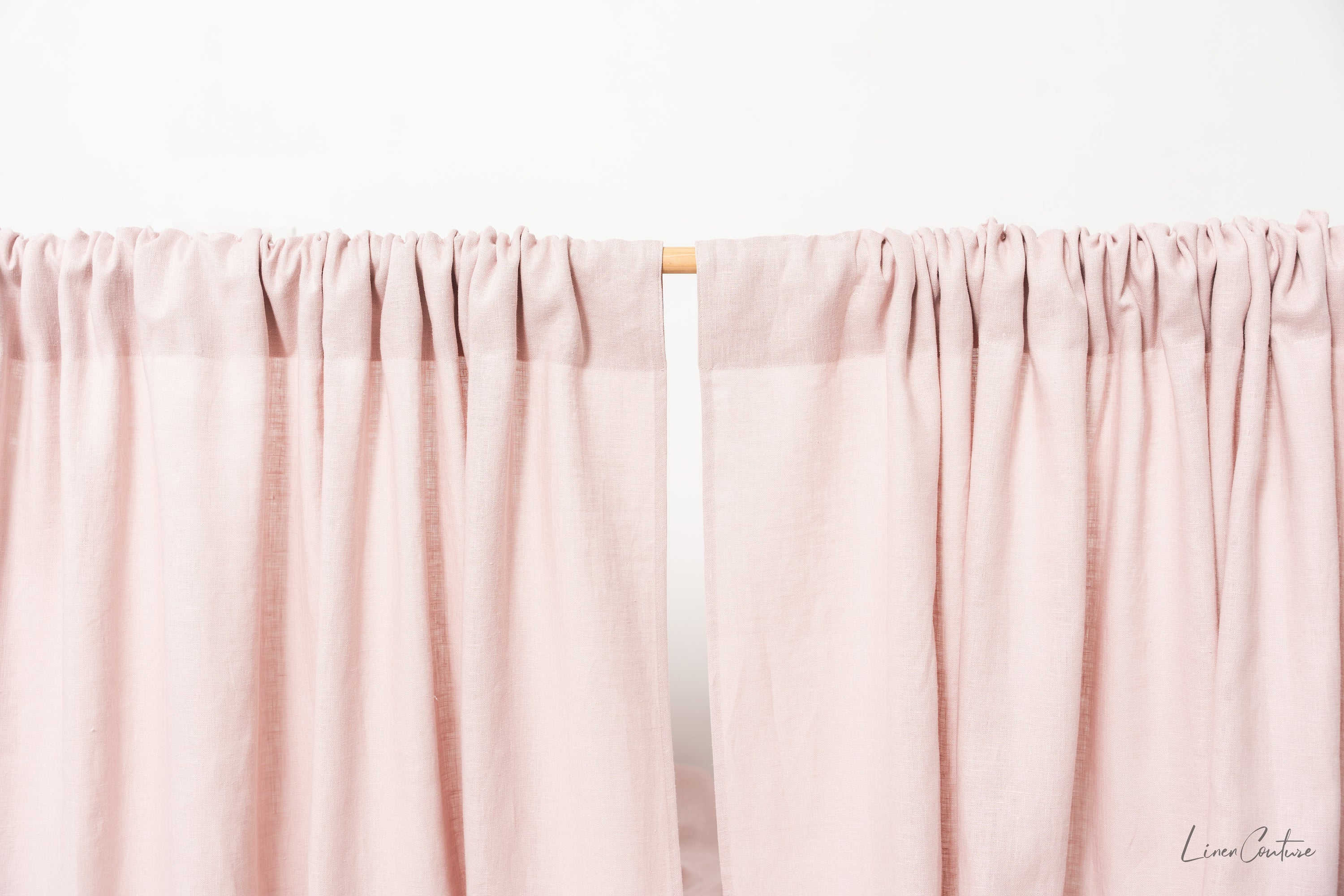 Pale Pink linen curtain panel with rod pocket, showcasing its soft texture and elegant color.