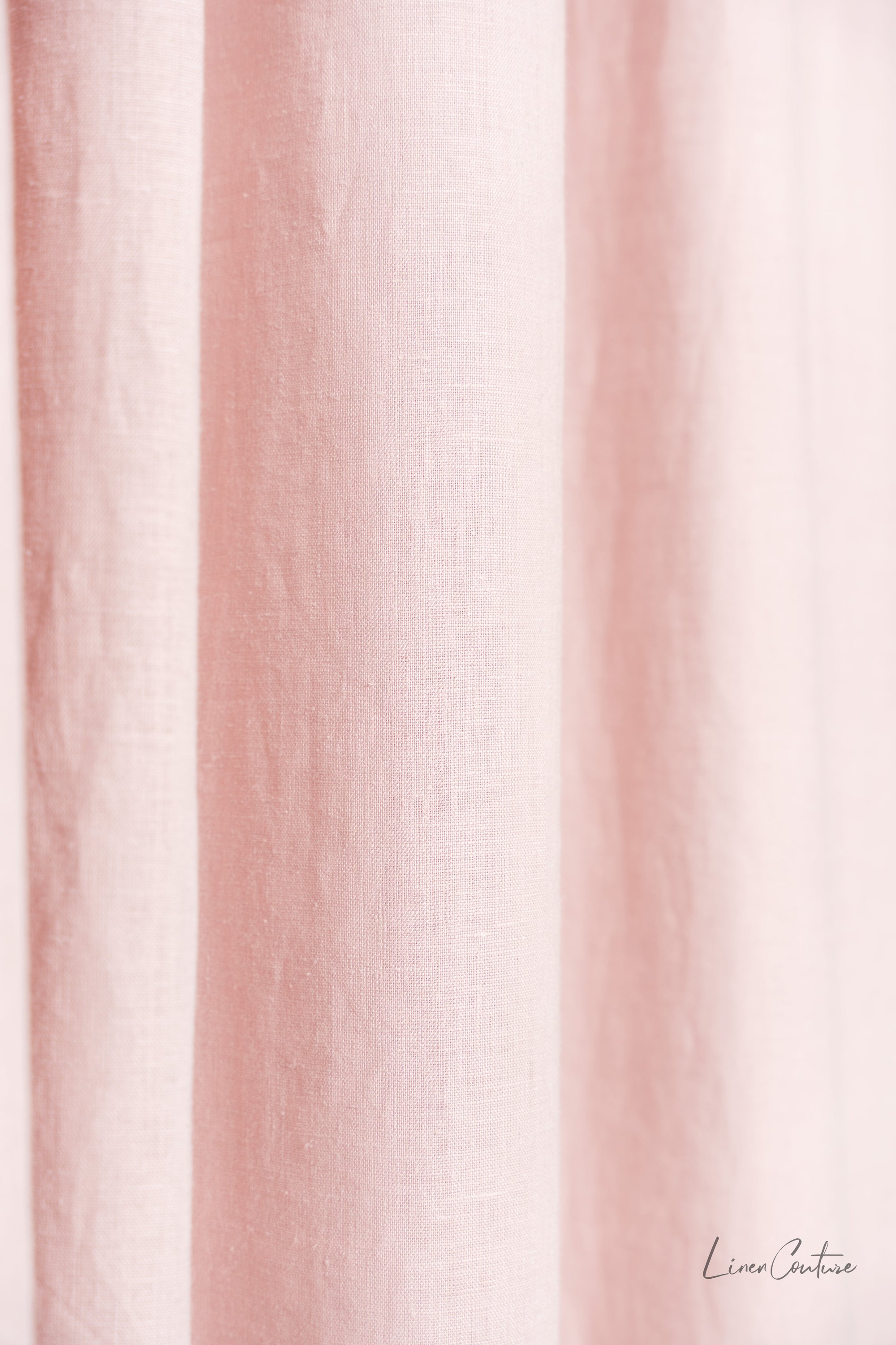 Pale Pink linen curtain panel with rod pocket, showcasing its soft texture and elegant color.