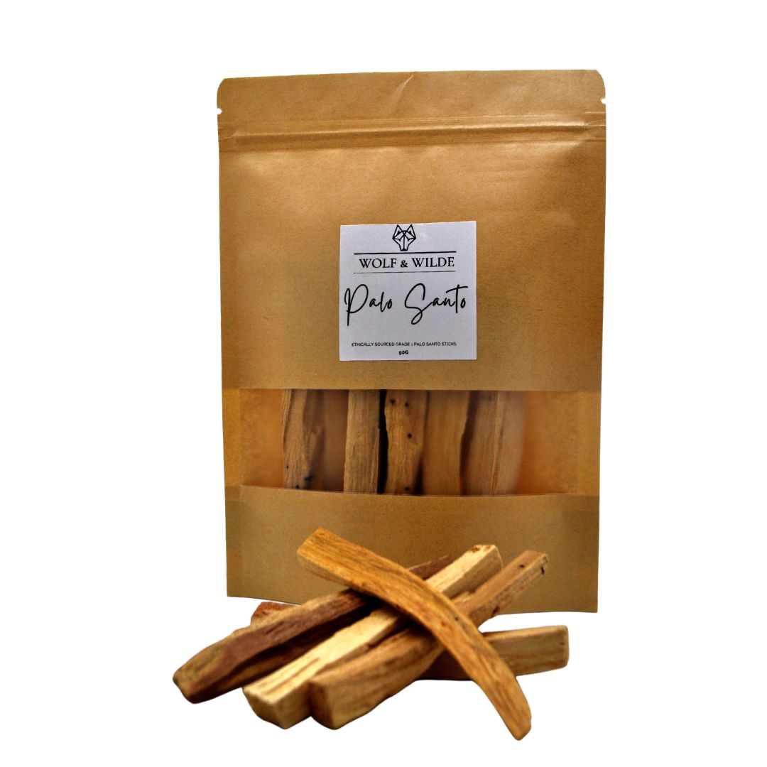 A collection of Grade 1 Palo Santo sticks, ethically sourced, showcasing their natural wood texture and color.