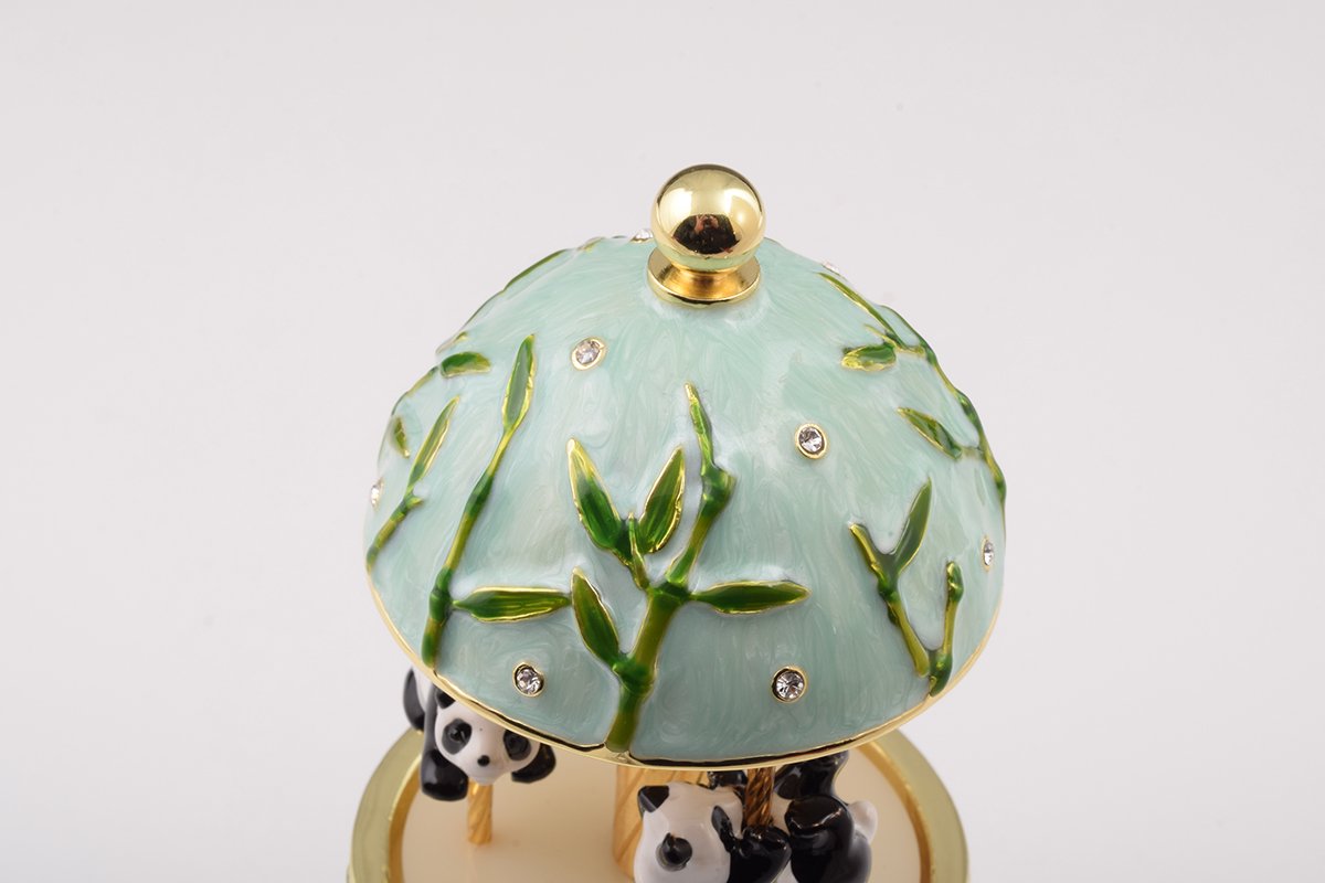 Panda Bears Musical Carousel trinket box with Austrian crystals and gold plating, showcasing intricate details and a charming design.