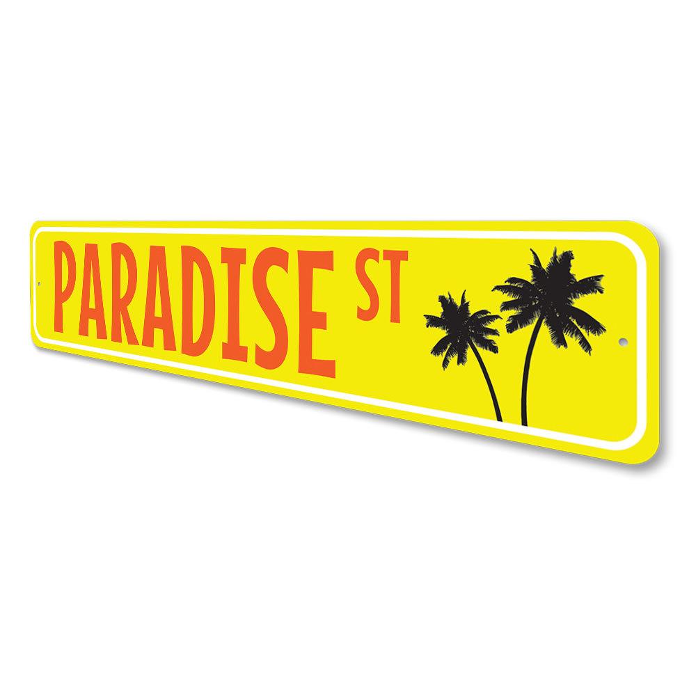 A vibrant Paradise Street Sign made of high-quality aluminum, featuring customizable text and a beach-themed design, perfect for coastal decor.