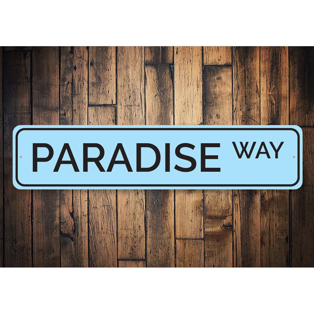 A beautifully crafted Paradise Way Sign made from high-quality aluminum, featuring customizable text and pre-drilled holes for easy mounting.