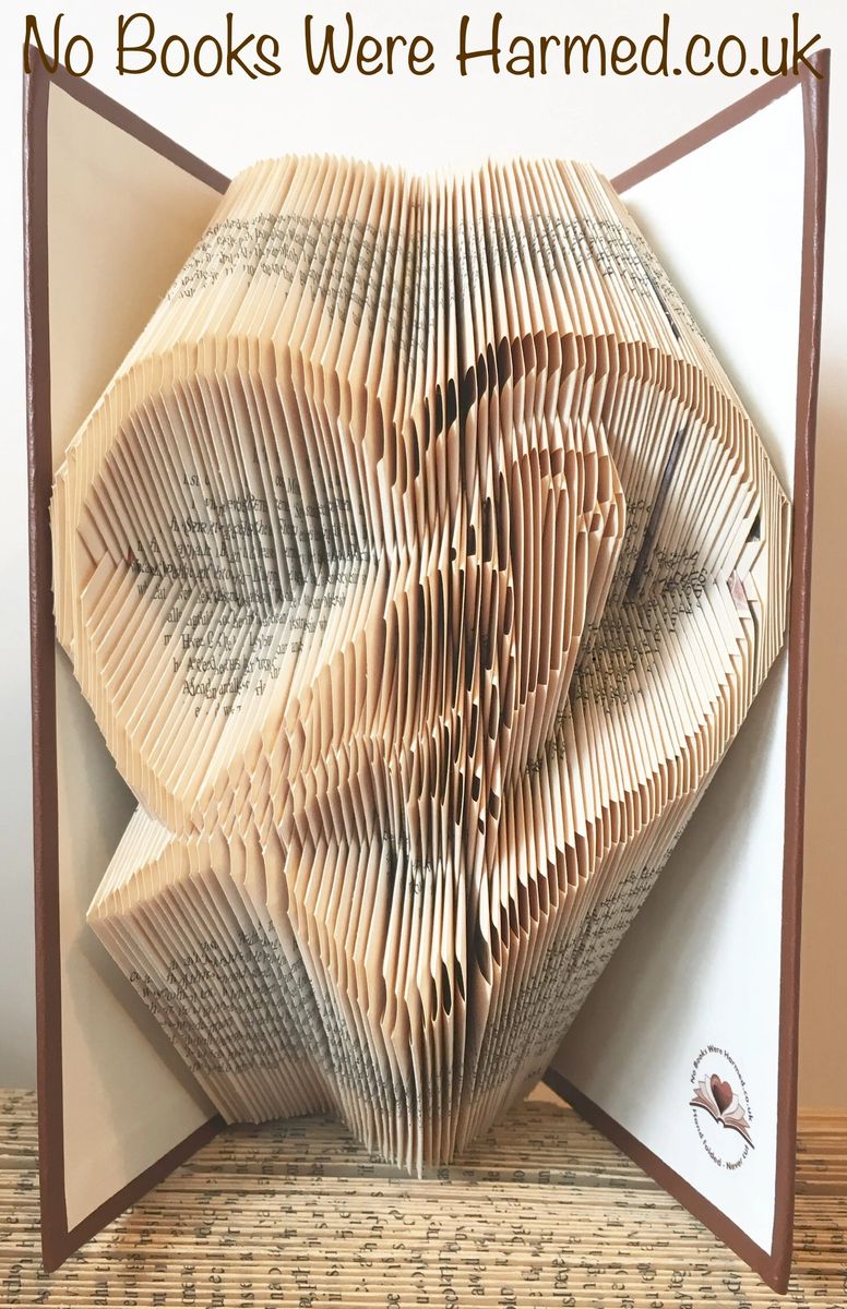 Handcrafted Parakeet in Heart art piece made from vintage book pages, showcasing intricate folds and unique design.