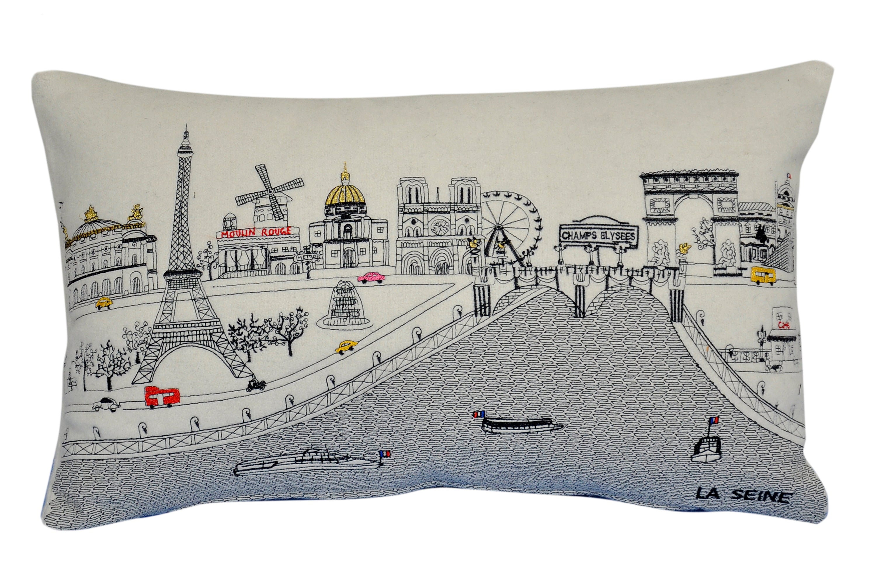 A decorative pillow featuring iconic Parisian landmarks like the Eiffel Tower and Notre-Dame Cathedral, with a red zipper at the bottom.