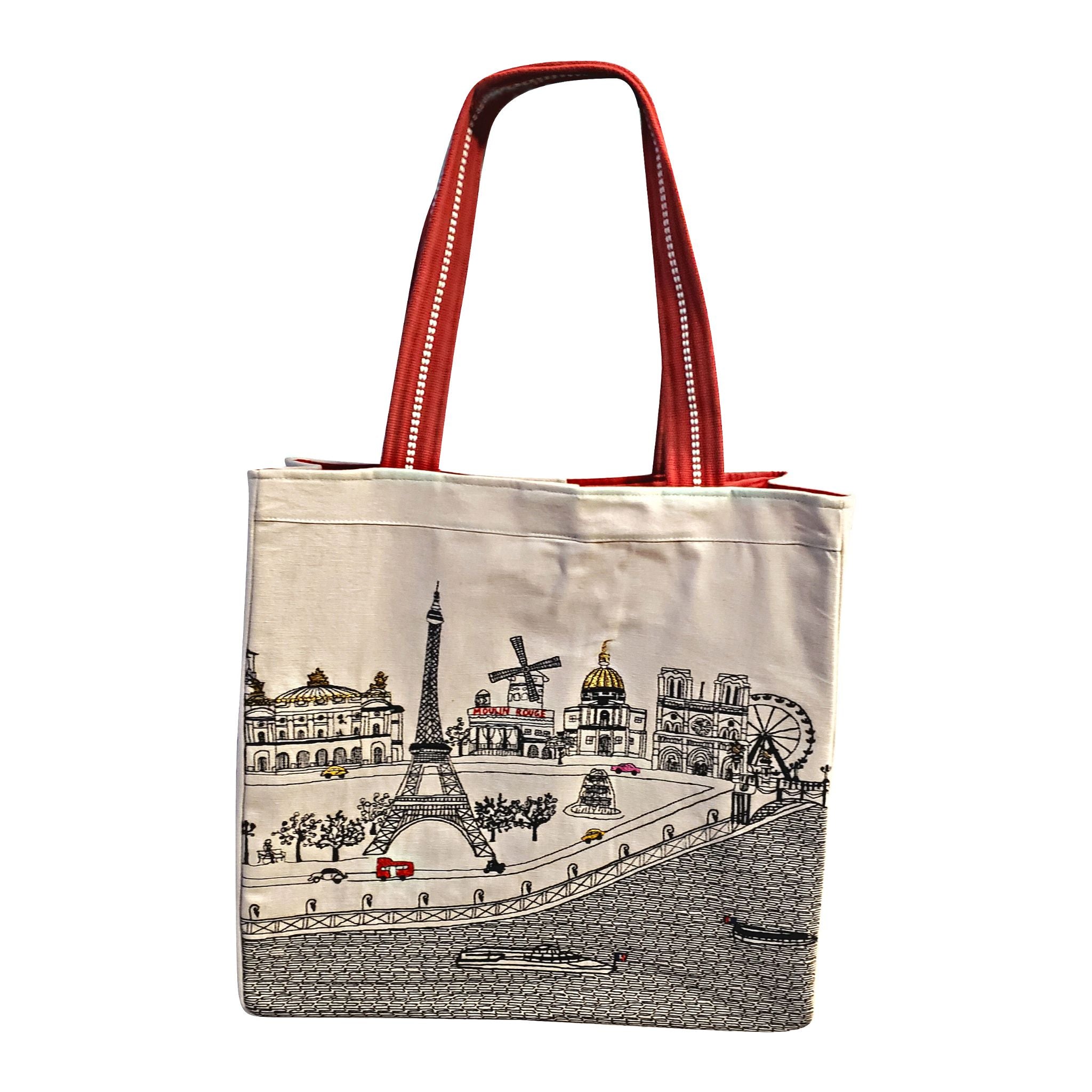 Stylish Paris Tote Bag with embroidered skyline in cream and black colors, featuring red waterproof lining and ribbed straps.