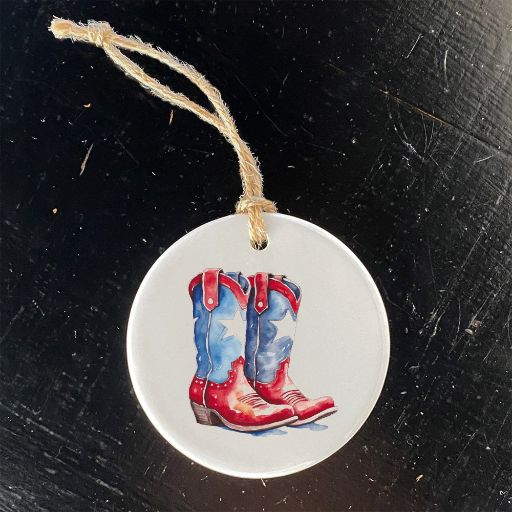 A beautifully crafted porcelain ornament featuring patriotic cowboy boots design, perfect for holiday decor or gifting.