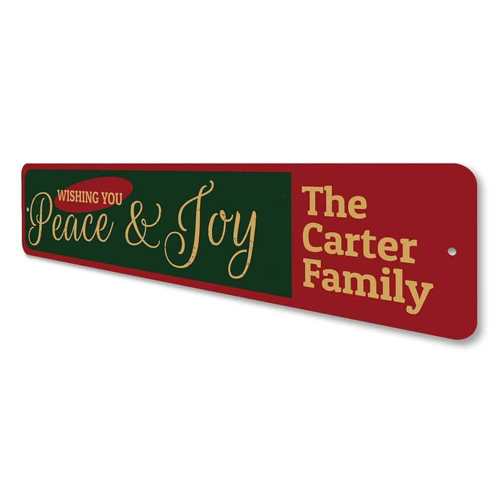 A beautifully designed Peace & Joy Sign featuring festive colors and motifs, perfect for Christmas decorations.