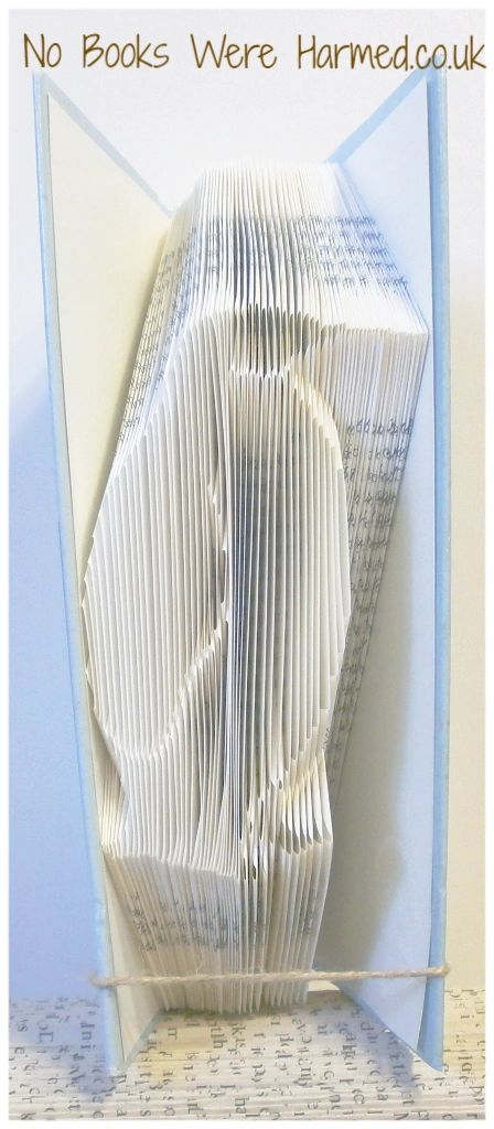 Handcrafted Penguin book art made from vintage pages, showcasing unique folds and intricate design.