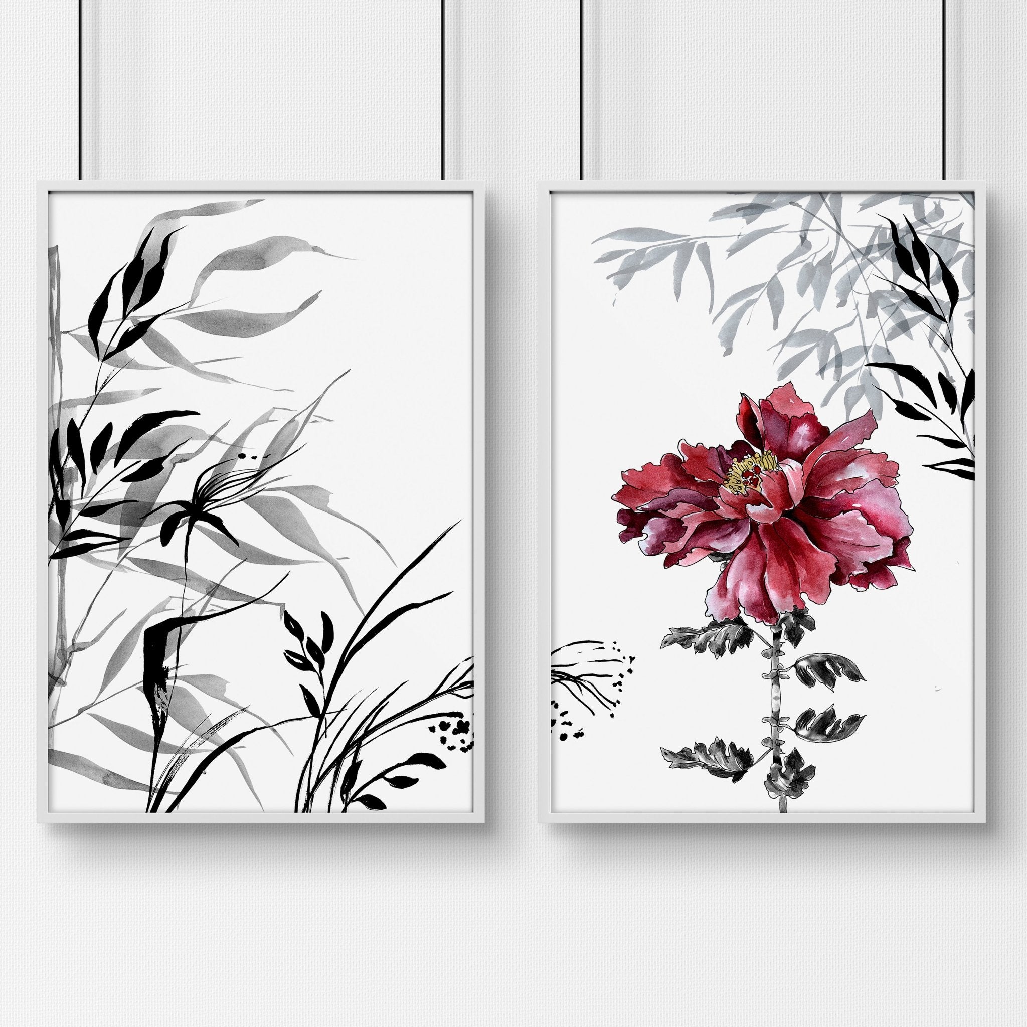 Set of 2 framed Red Peony Wall Art prints showcasing vibrant red flowers in elegant frames.