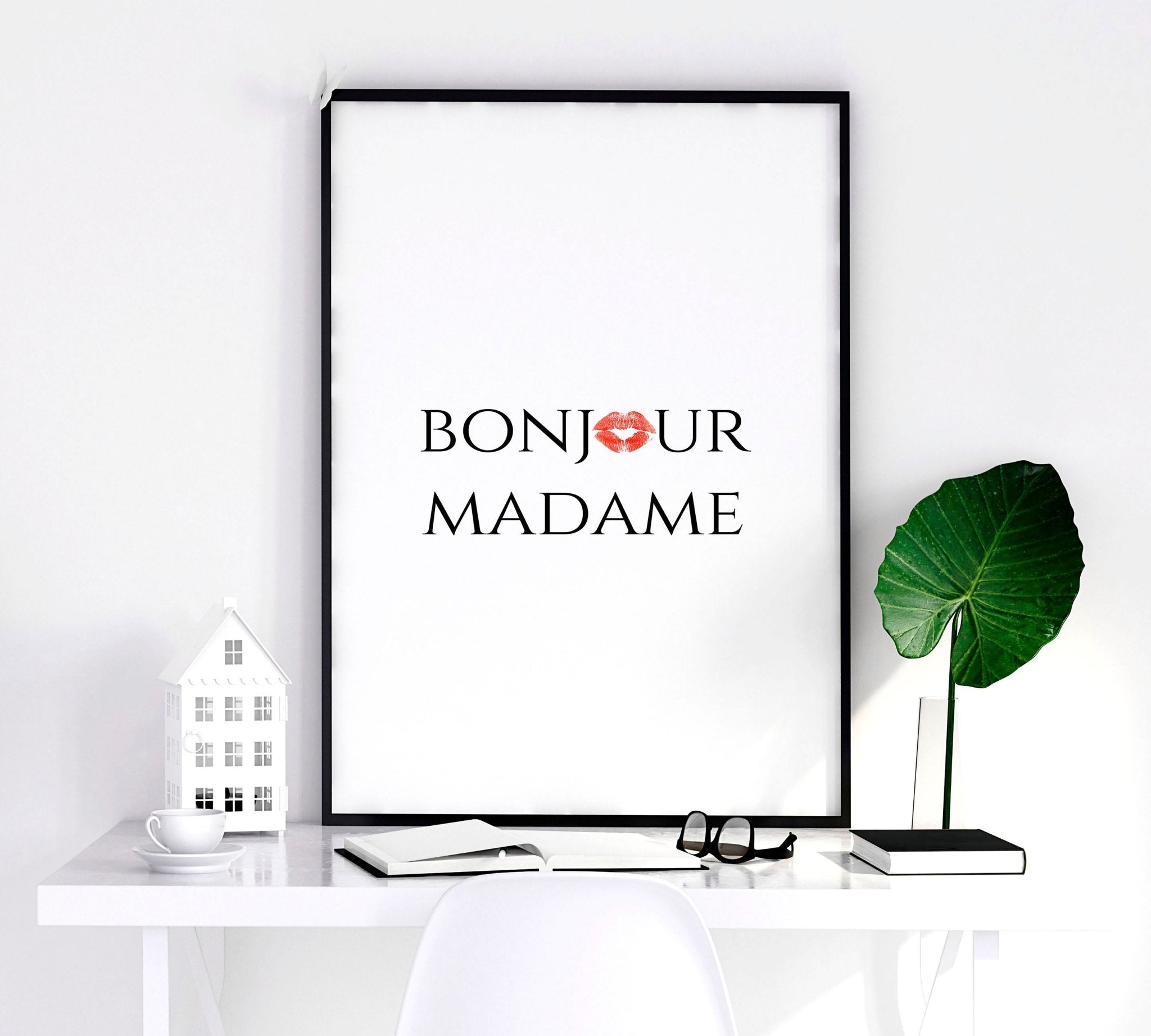 Set of 2 wall art prints featuring 'Bonjour Madame' and 'Bonjour Monsieur' phrases, perfect for romantic home decor.