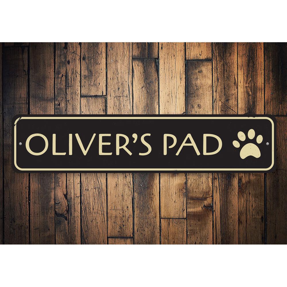 A customizable Pet Pad Sign made of high-quality aluminum, featuring pre-drilled holes for easy mounting, showcasing a unique design.