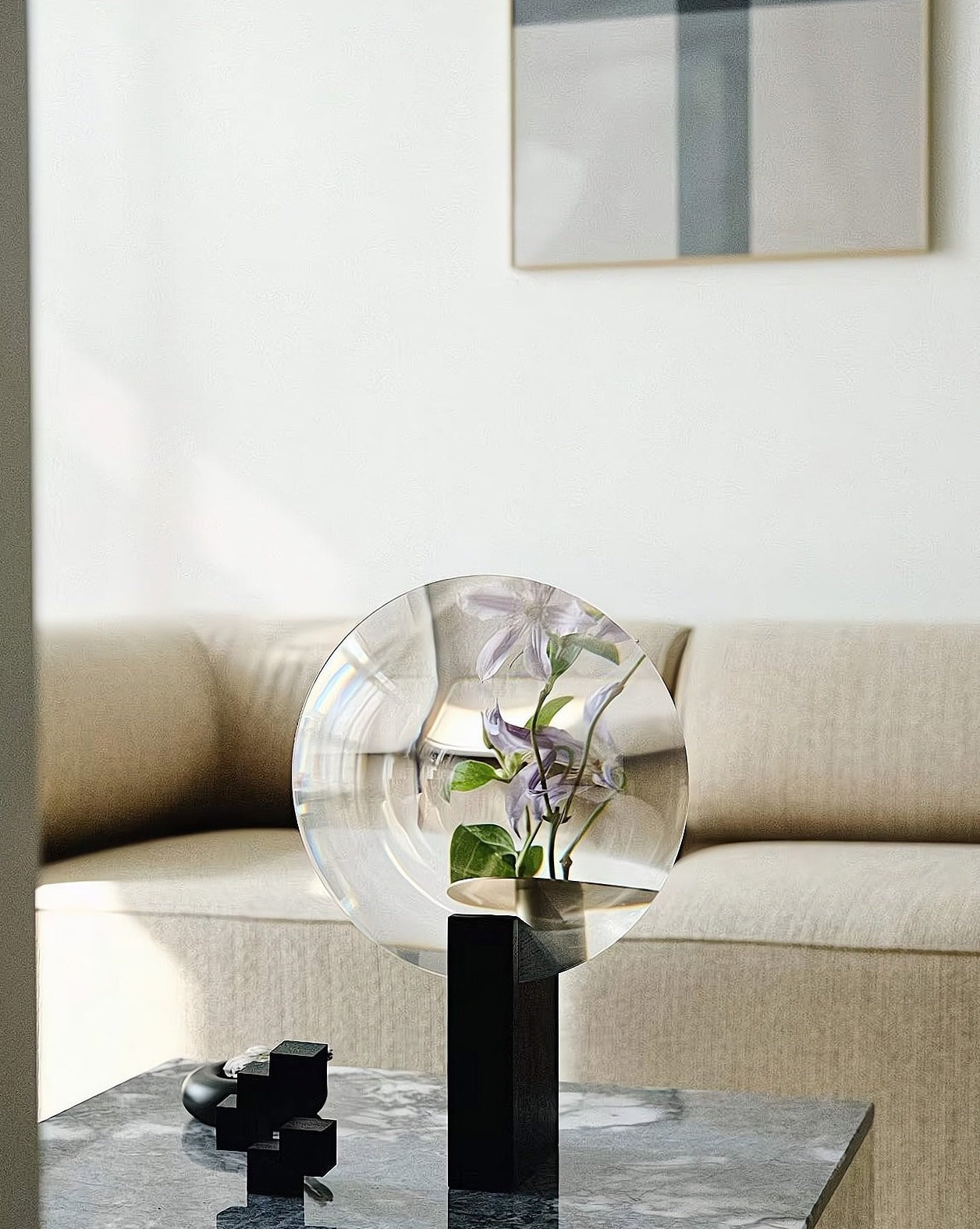 A modern decorative Phantom Vase showcasing a unique floating flower illusion, crafted from acrylic and metal, elegantly displayed with flowers.