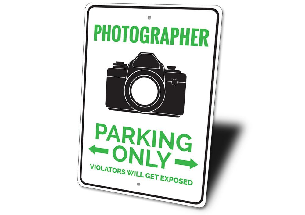 A customizable Photographer Parking Sign made from high-quality aluminum, featuring pre-drilled holes for easy mounting.