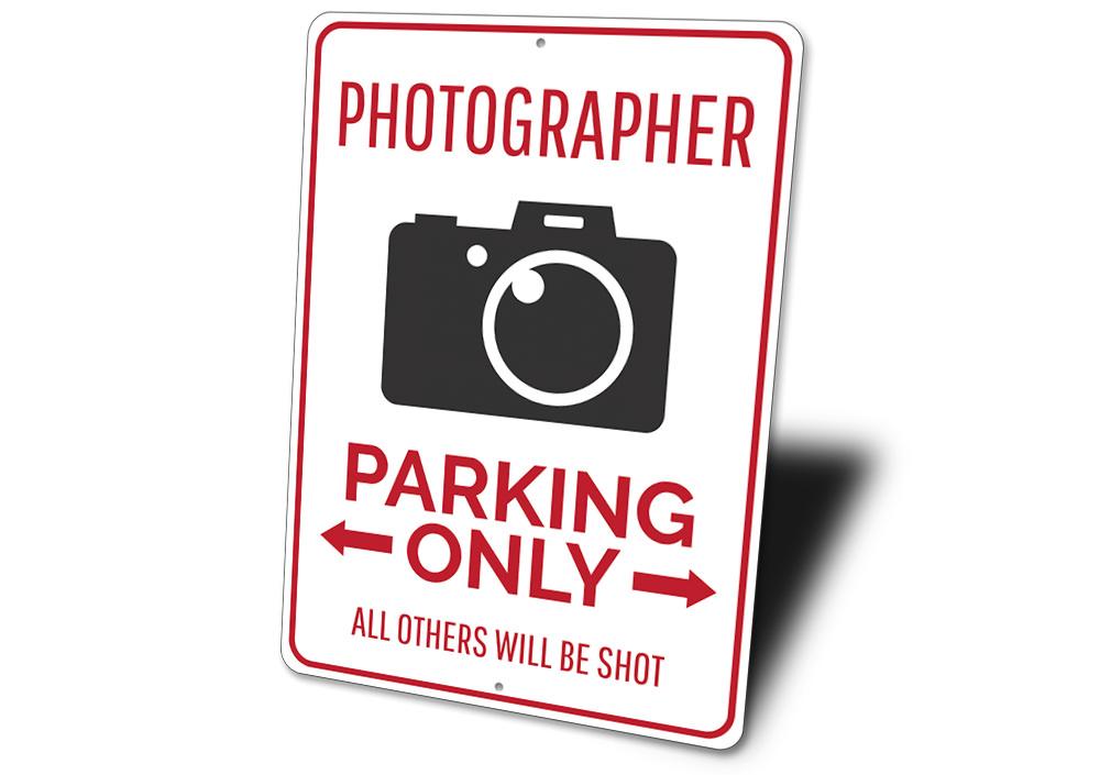 A customizable Photographer Parking Sign made of high-quality aluminum, featuring a unique design suitable for various vehicles.