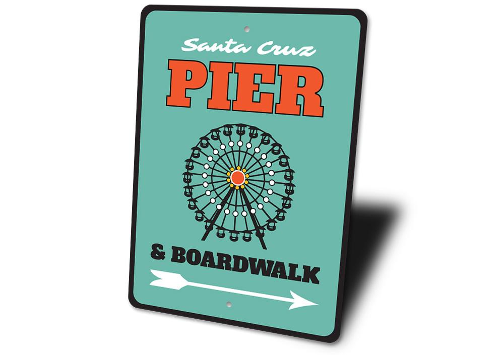 A decorative Pier and Boardwalk Sign made of high-quality aluminum, featuring coastal-themed designs, perfect for beach houses and outdoor decor.