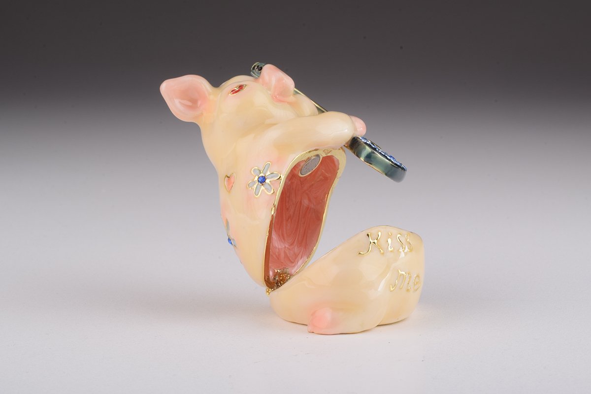 A beautifully crafted enamel trinket box featuring a pig playing guitar, adorned with sparkling Austrian crystals and plated with gold or silver.