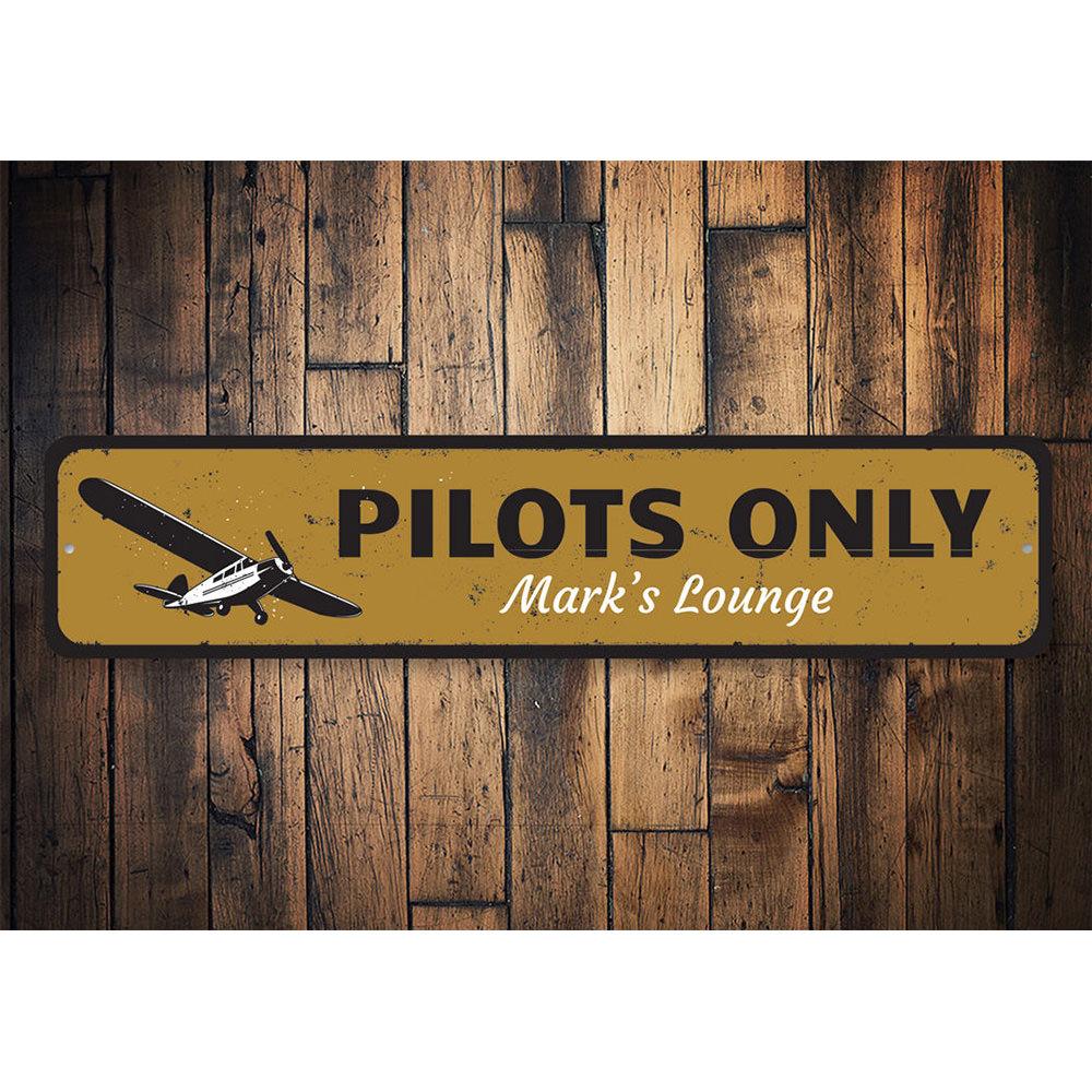 A decorative Pilots Only sign made of high-quality aluminum, featuring customizable text, ideal for aviation enthusiasts.