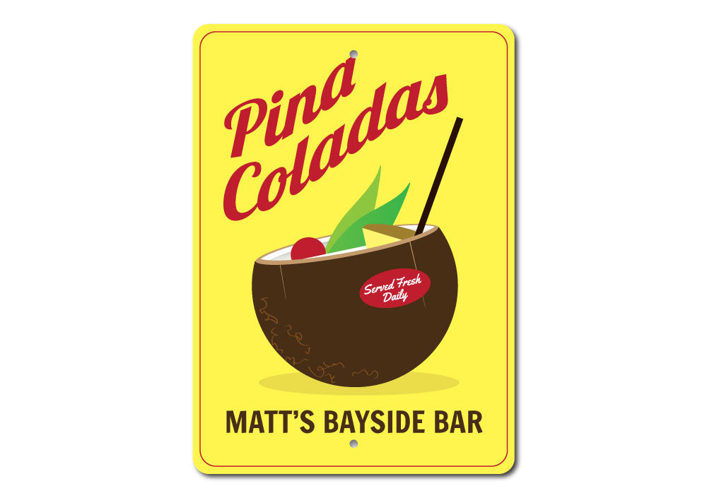 A vibrant Pina Colada Sign made of aluminum, featuring tropical design elements, perfect for home decor.