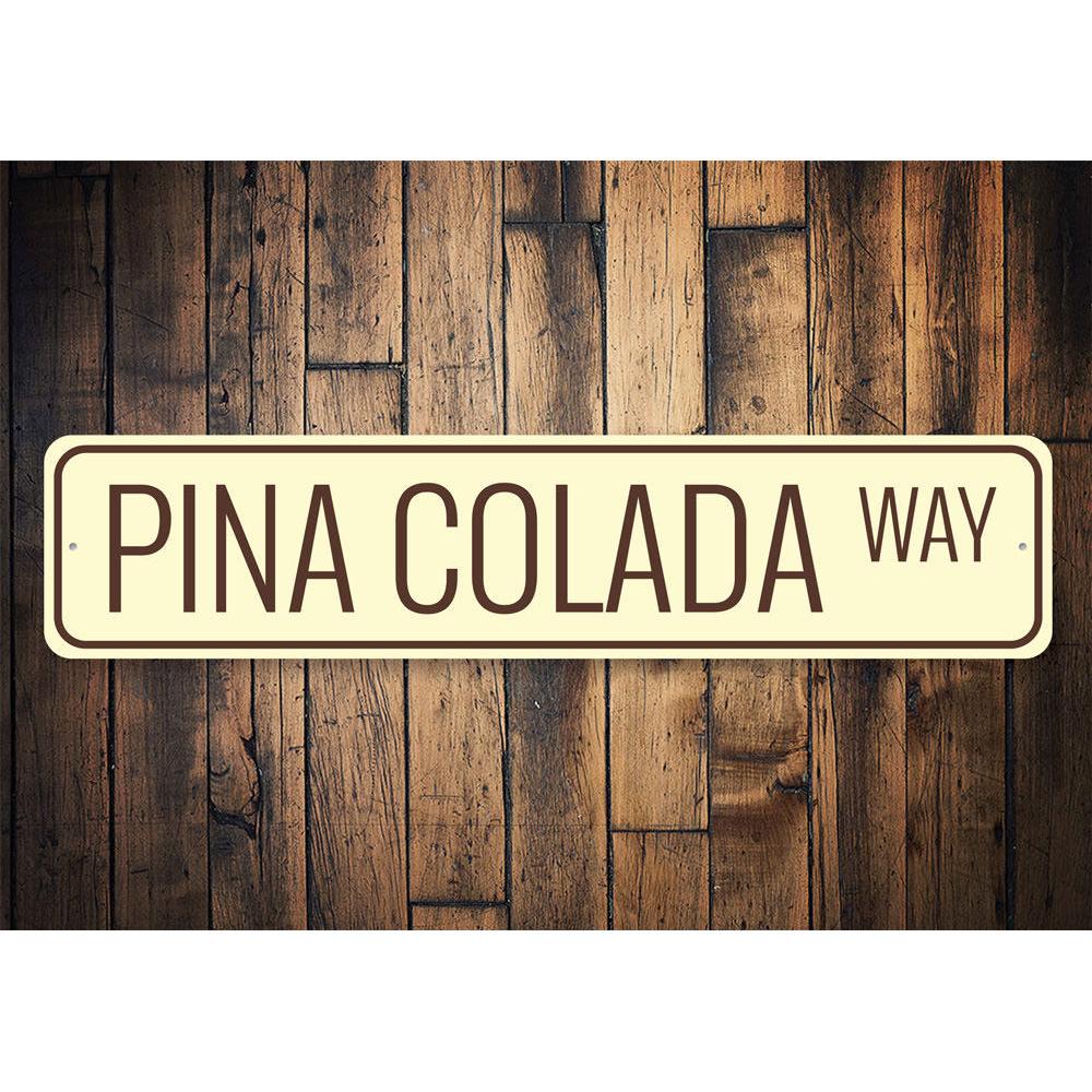 Pina Colada Way Sign featuring vibrant tropical design, made of durable aluminum, perfect for home decor.